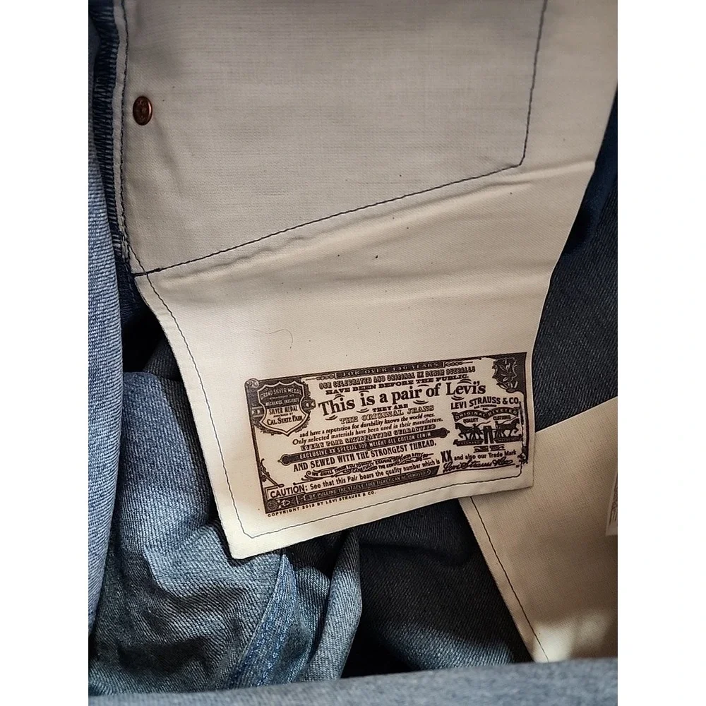 Levi's 501 men's 38X30 Buttonfly Light blue jeans Shrink To Fit Straight Leg NWT